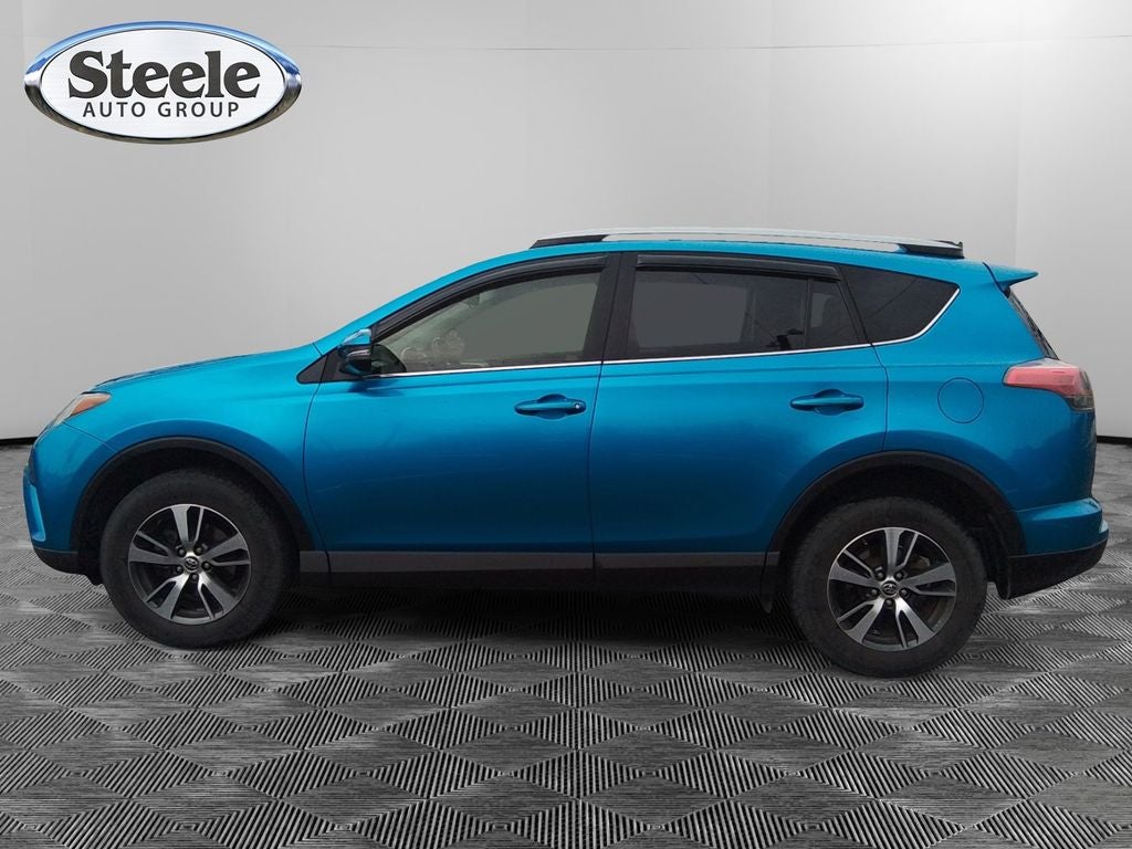 Used 2017 Toyota RAV4 XLE with VIN JTMWFREV8HJ102718 for sale in New Braunfels, TX